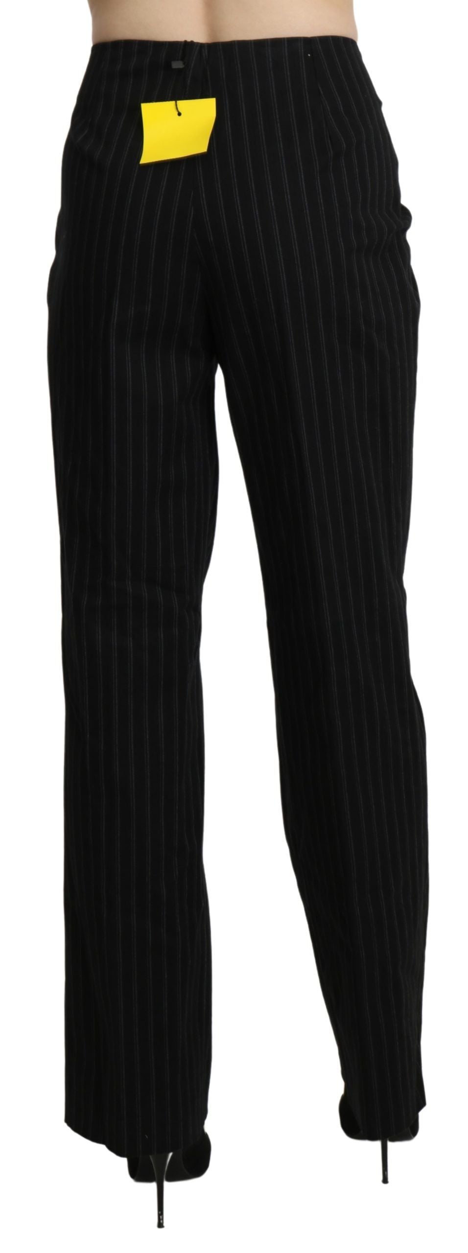 A pair of black high waist straight dress trousers with a yellow pocket on the right side