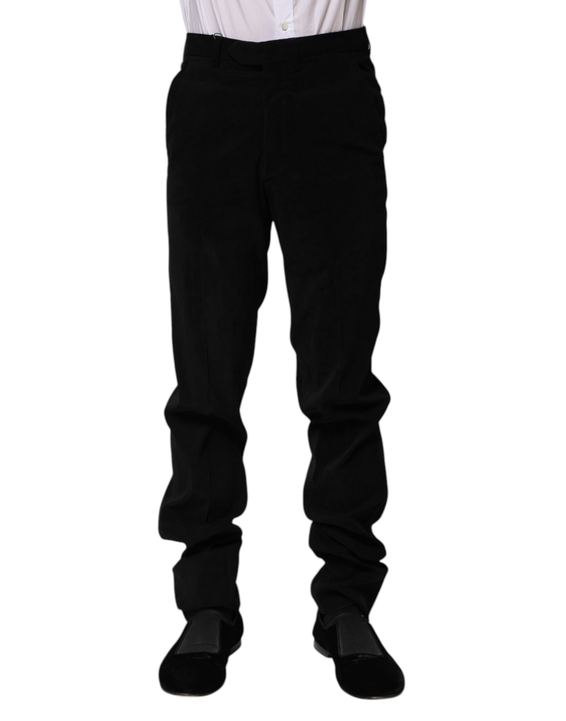 A pair of black mid-waist dress pants