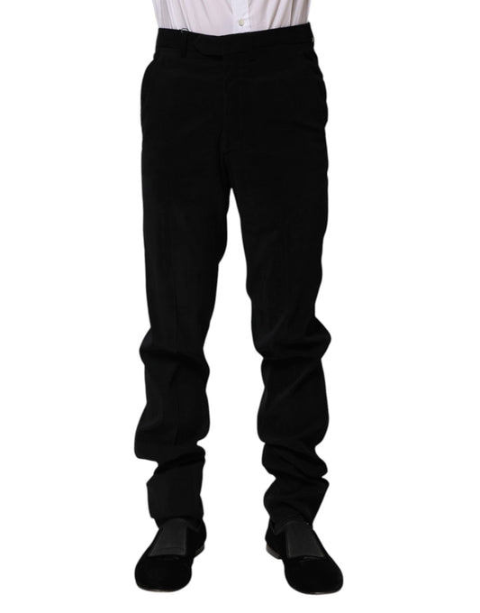 A pair of black mid-waist dress pants