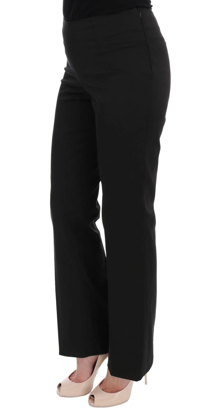 Woman wearing black pants and heels