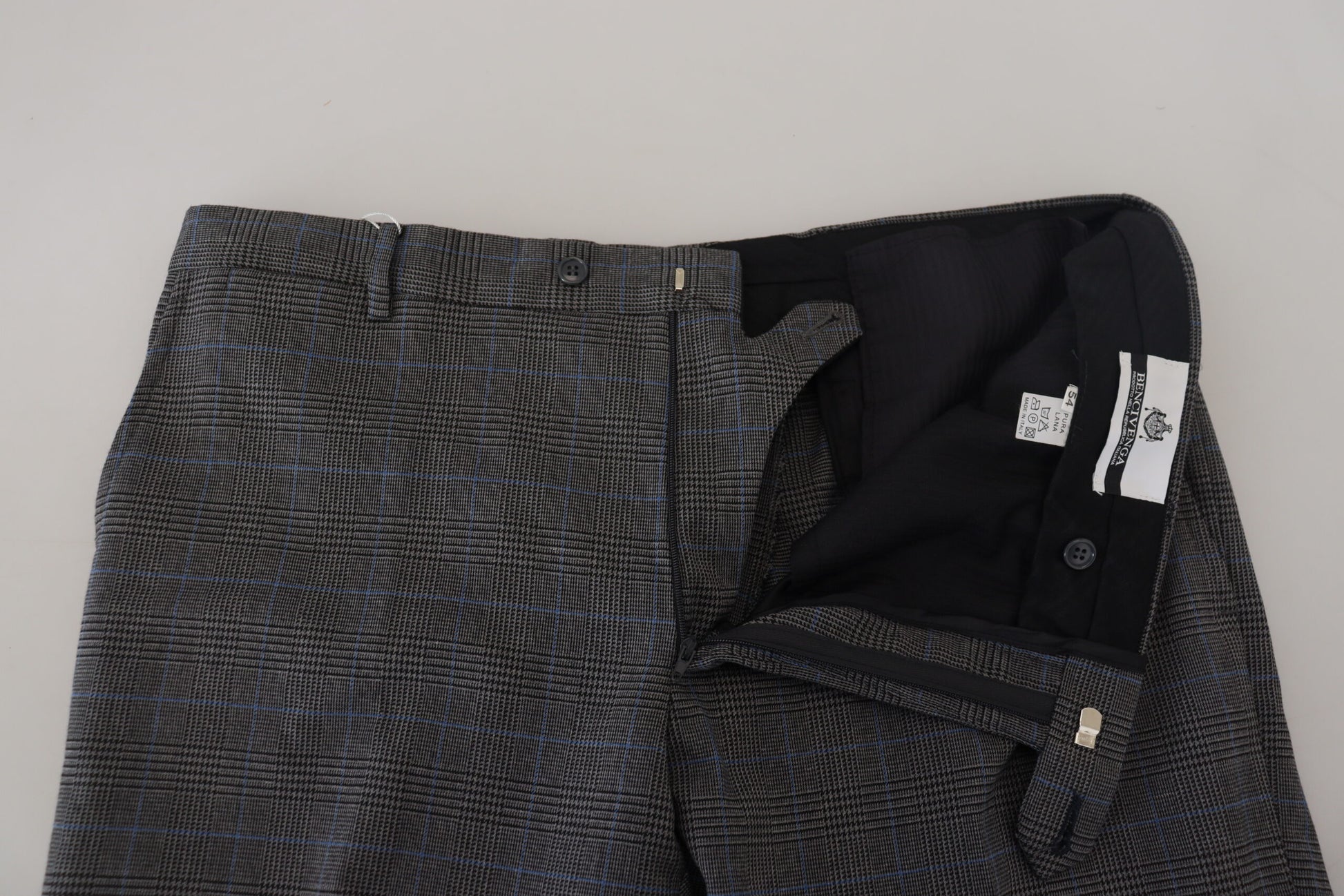Men's gray checkered wool dress pants with black buttons and a label on the waistband