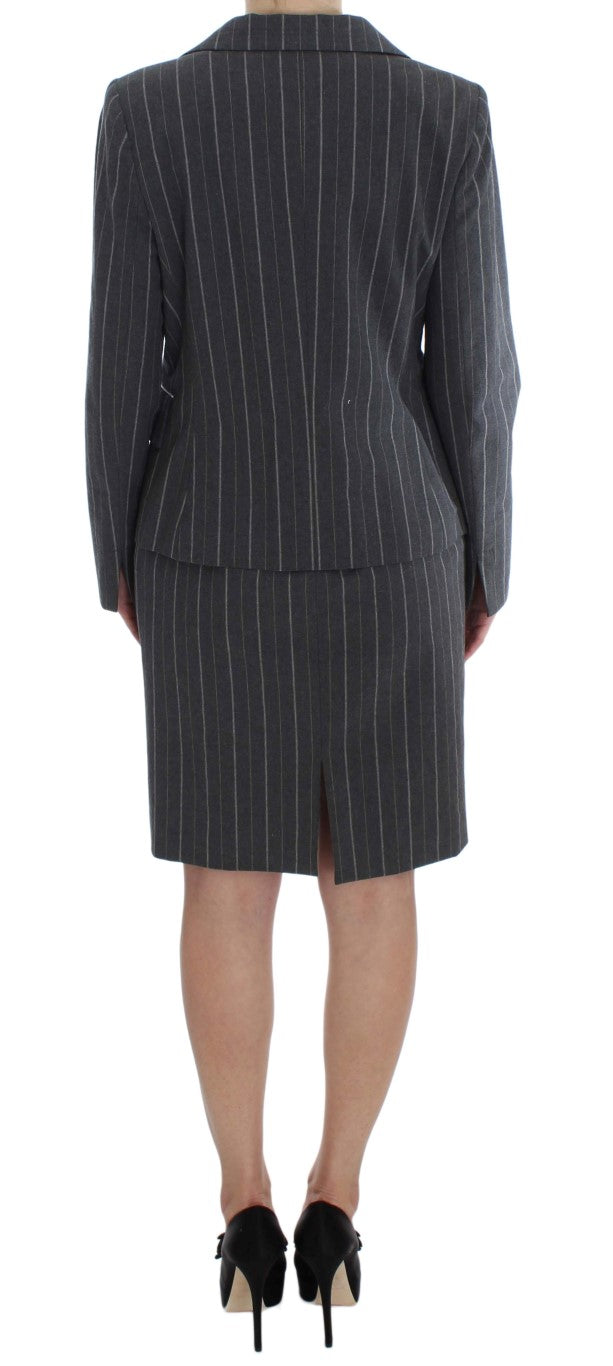 A gray pinstripe suit with a matching blazer and skirt