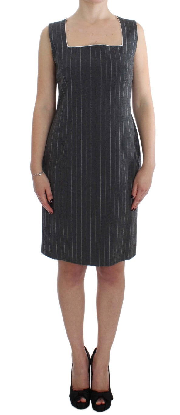 A gray stretch suit dress with a matching blazer set