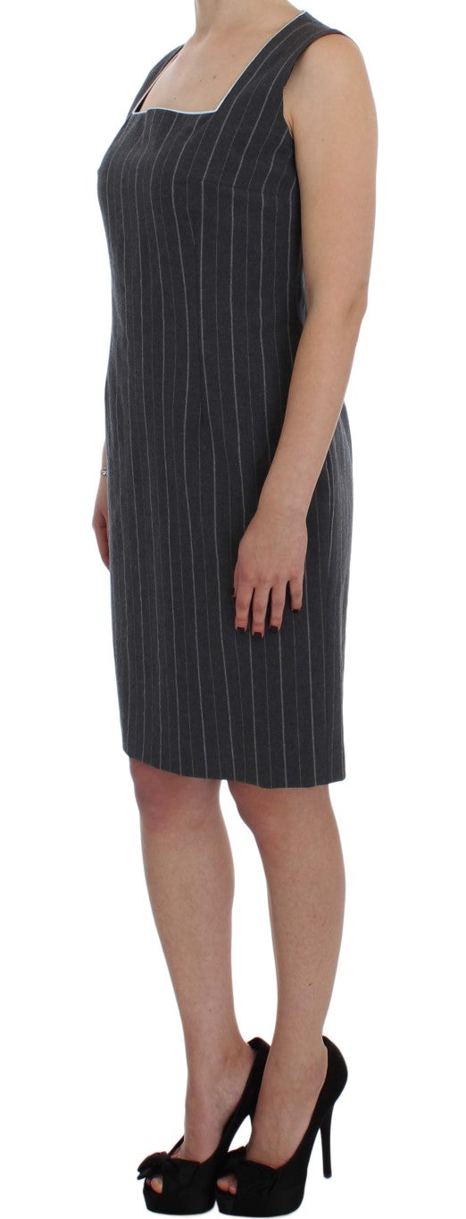 A gray dress with a blazer set, featuring a sheath design and stretch material