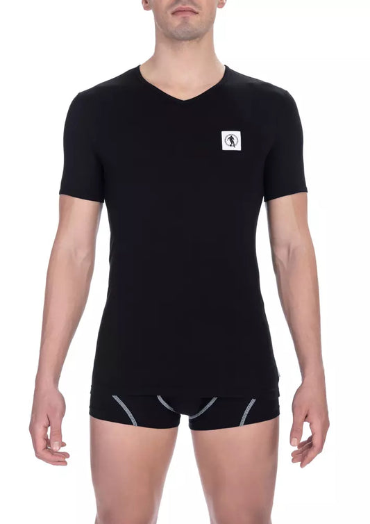 Black sleeveless shirt on a mannequin torso