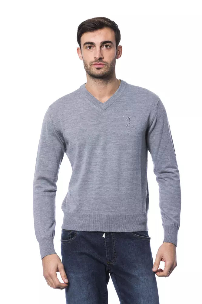 Man wearing a gray sweater
