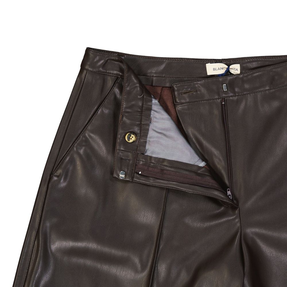 Pair of brown leather pants with zippered pockets