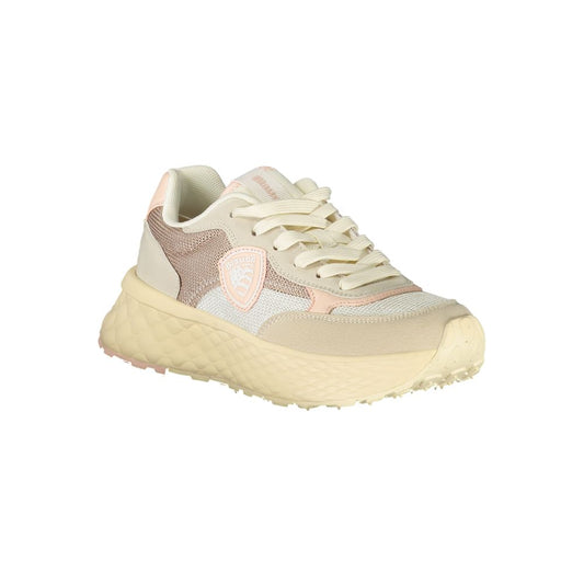 A beige women's sneaker with a textured sole, lace-up front and pink accents