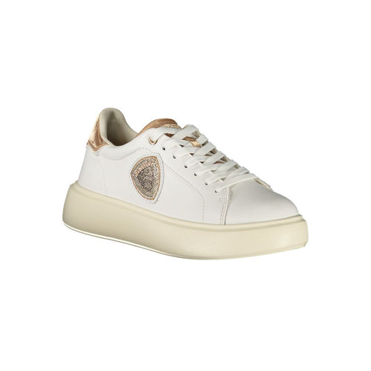 White sneaker with gold accents, lace-up closure, and a logo on the side