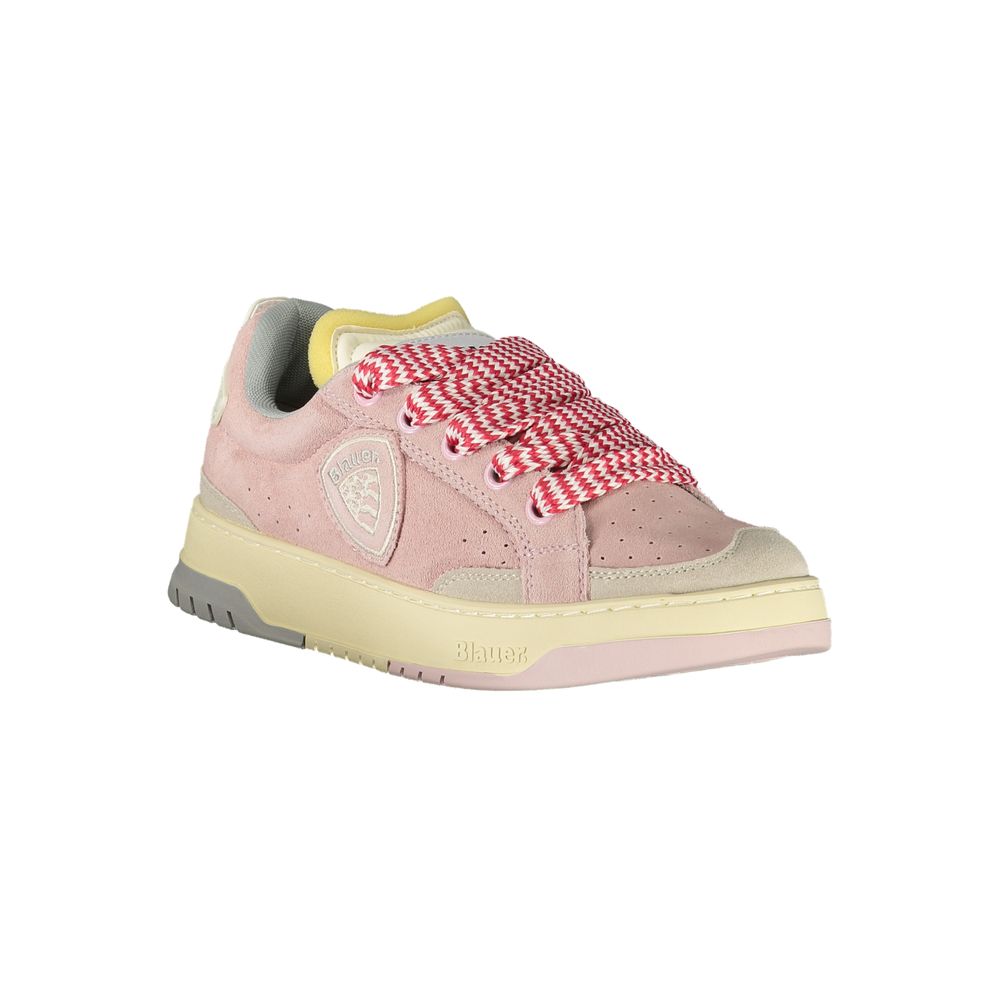 Pink women's sneakers with white sole, laces, and red bow detail