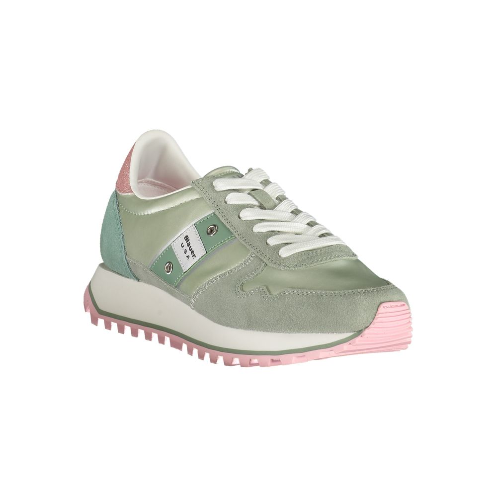 Green women's sneaker with pink sole, laces, and accents