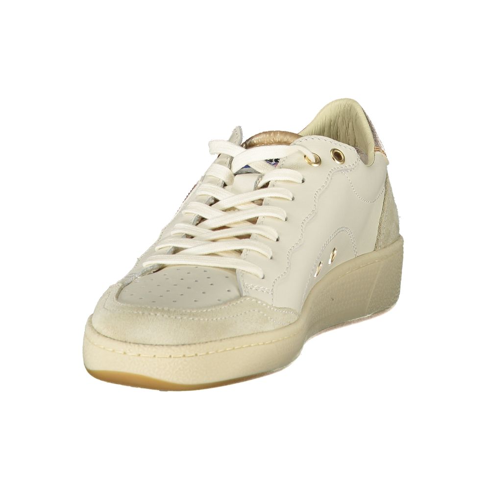A white leather women's sneaker with a gold buckle, featuring a low top and a flat sole