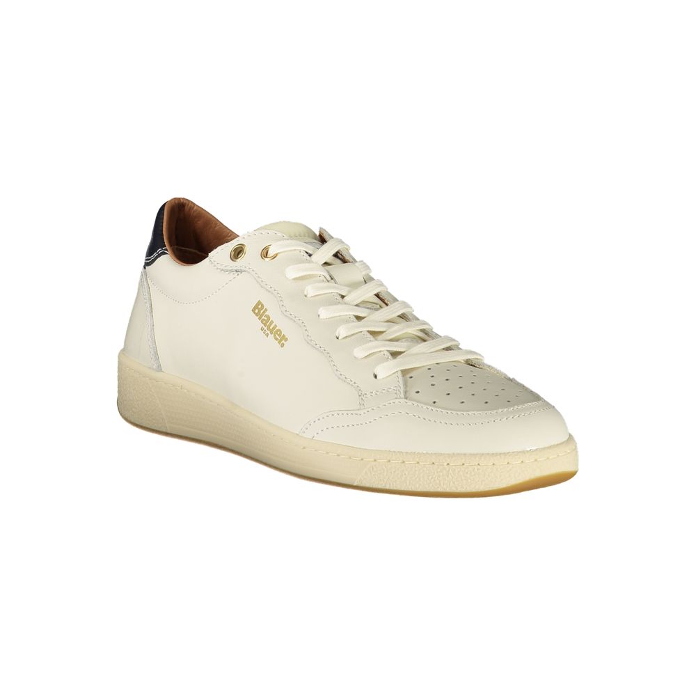 A white sneaker with a tan sole