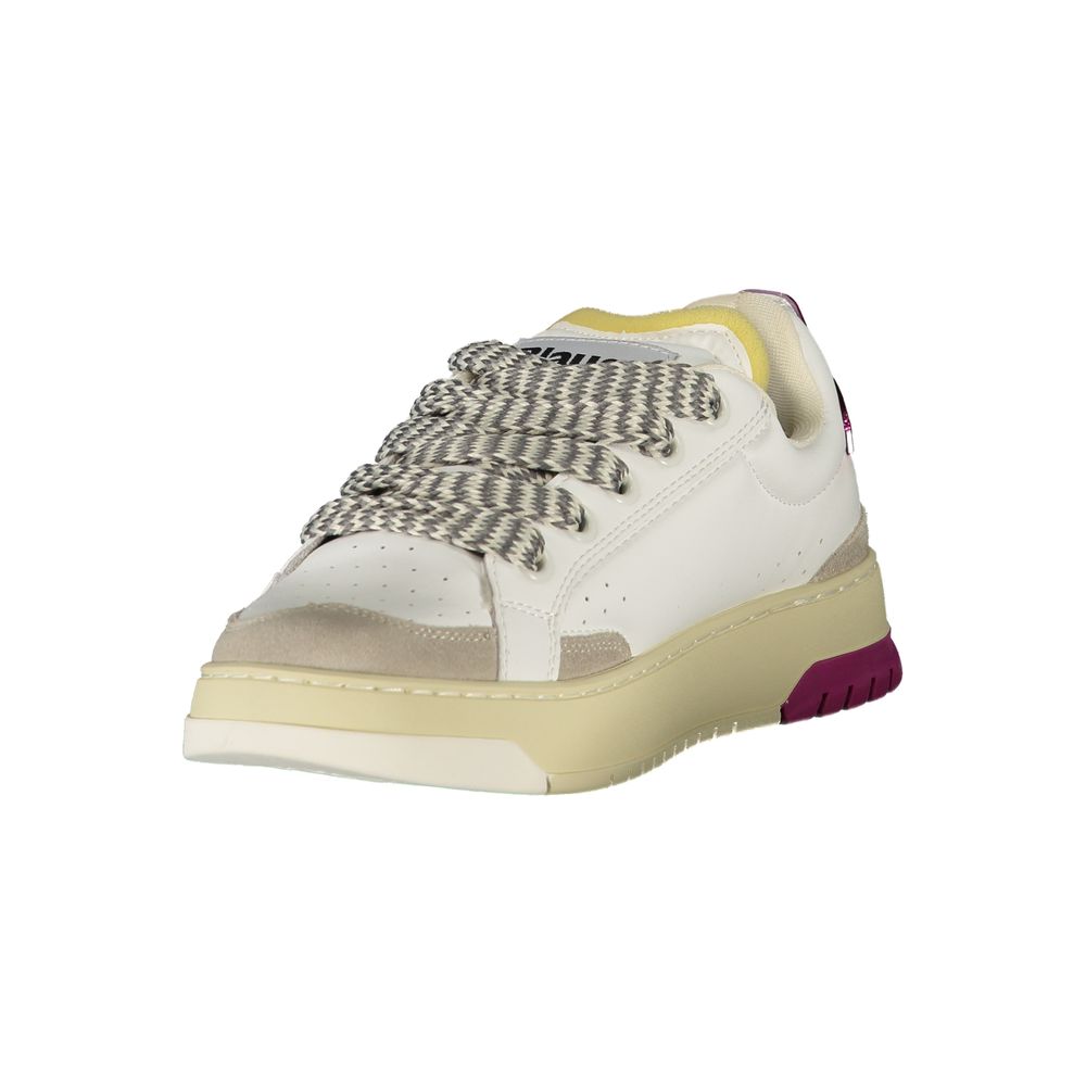 A white sneaker with a tan sole for women, featuring a lace-up front and a patterned design on the side
