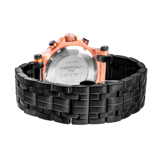A black stainless steel watch with a copper-colored face, featuring a logo and text on the dial