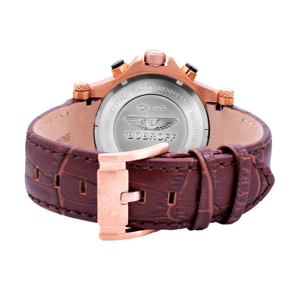 A brown leather watch with a copper buckle and a silver face featuring the Bentley logo
