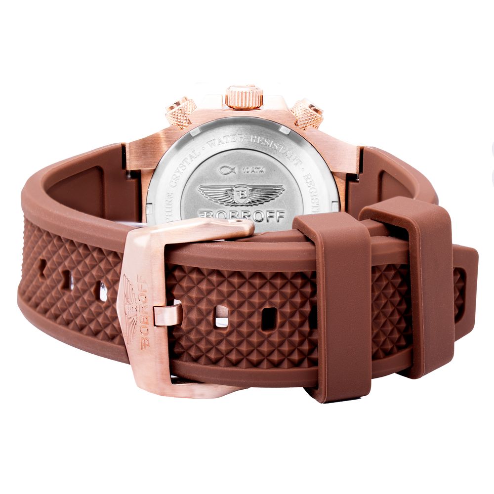 A brown rubber watch with a copper buckle and a silver face featuring the Rolex logo