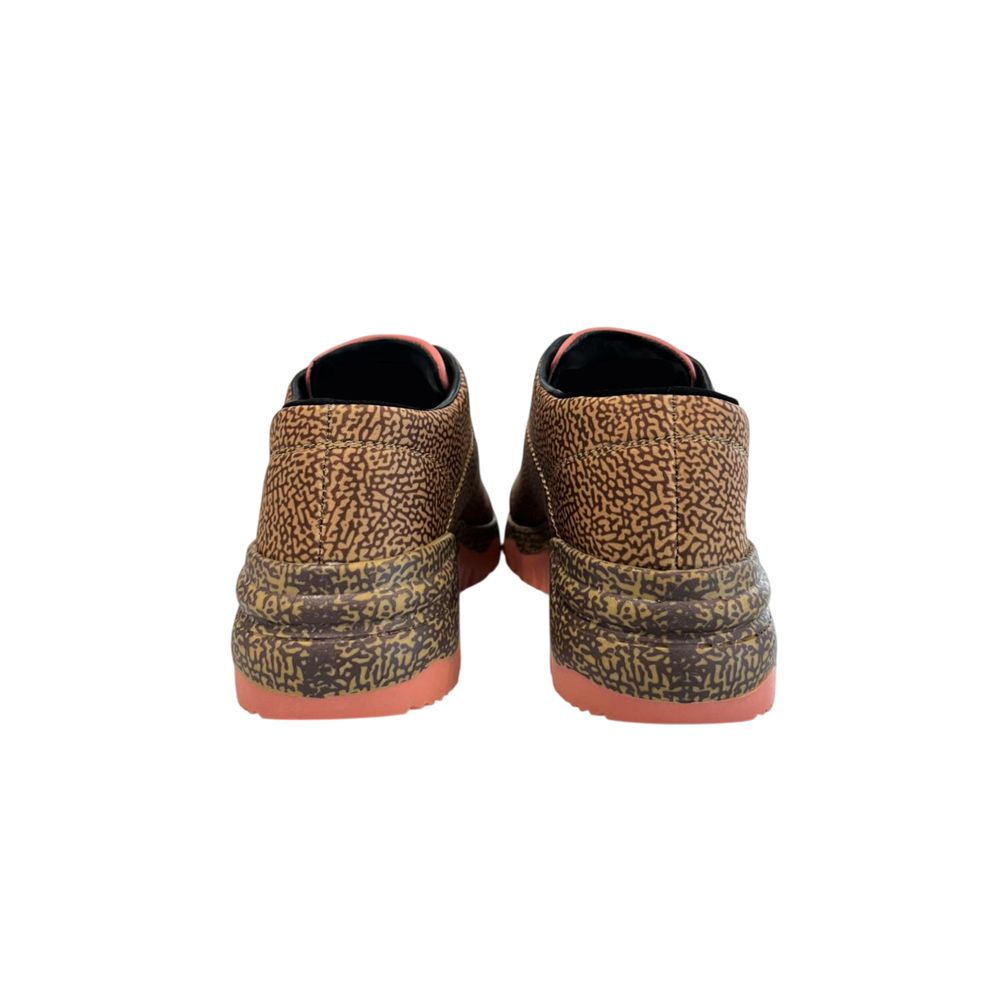 Pair of women's sneakers with beige leather upper, red sole and laces, designed by Borbonese