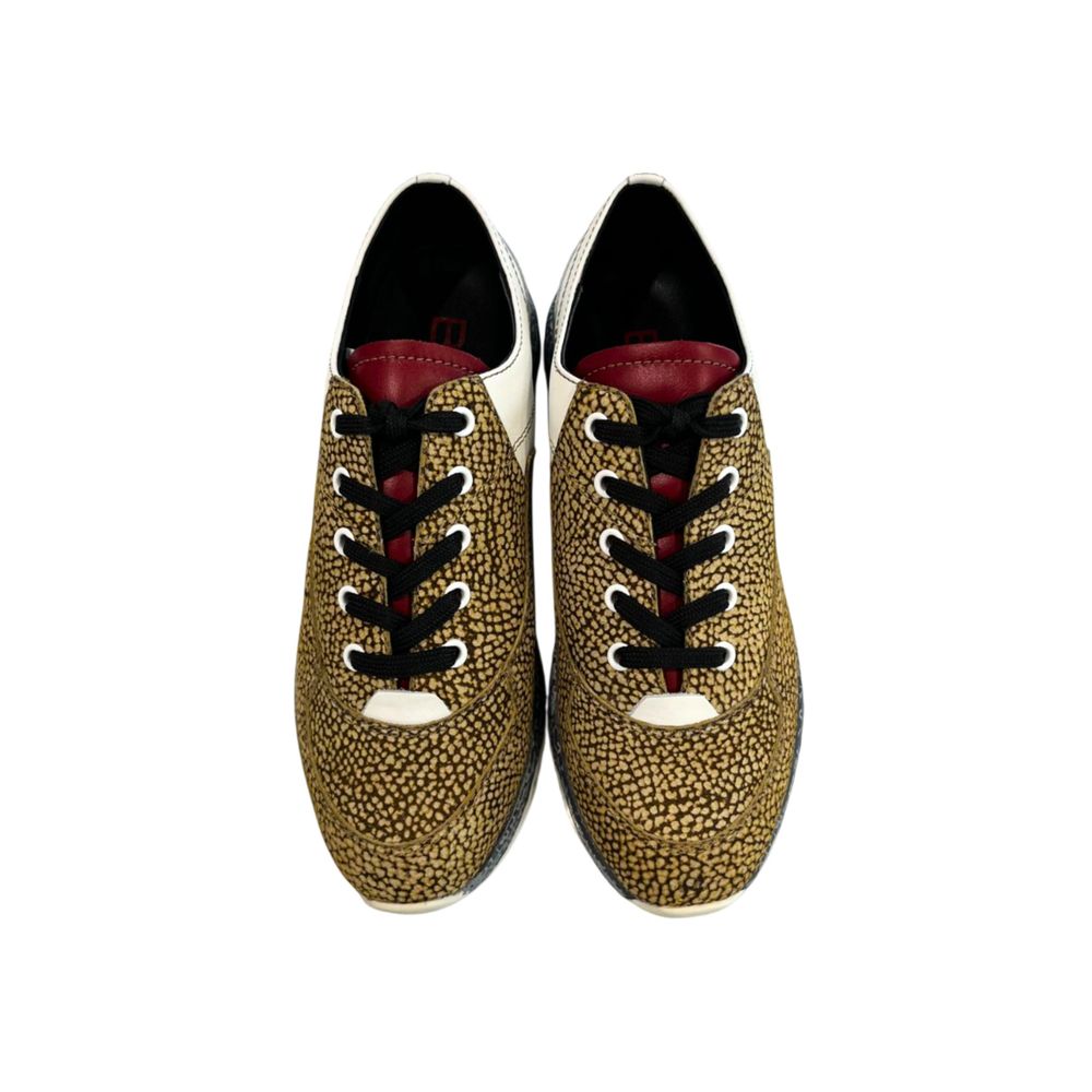Pair of women's sneakers with lace-up front, beige leather upper and red accents