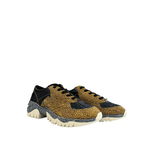 A pair of women's sneakers with a beige leather upper, featuring a textured pattern and white laces