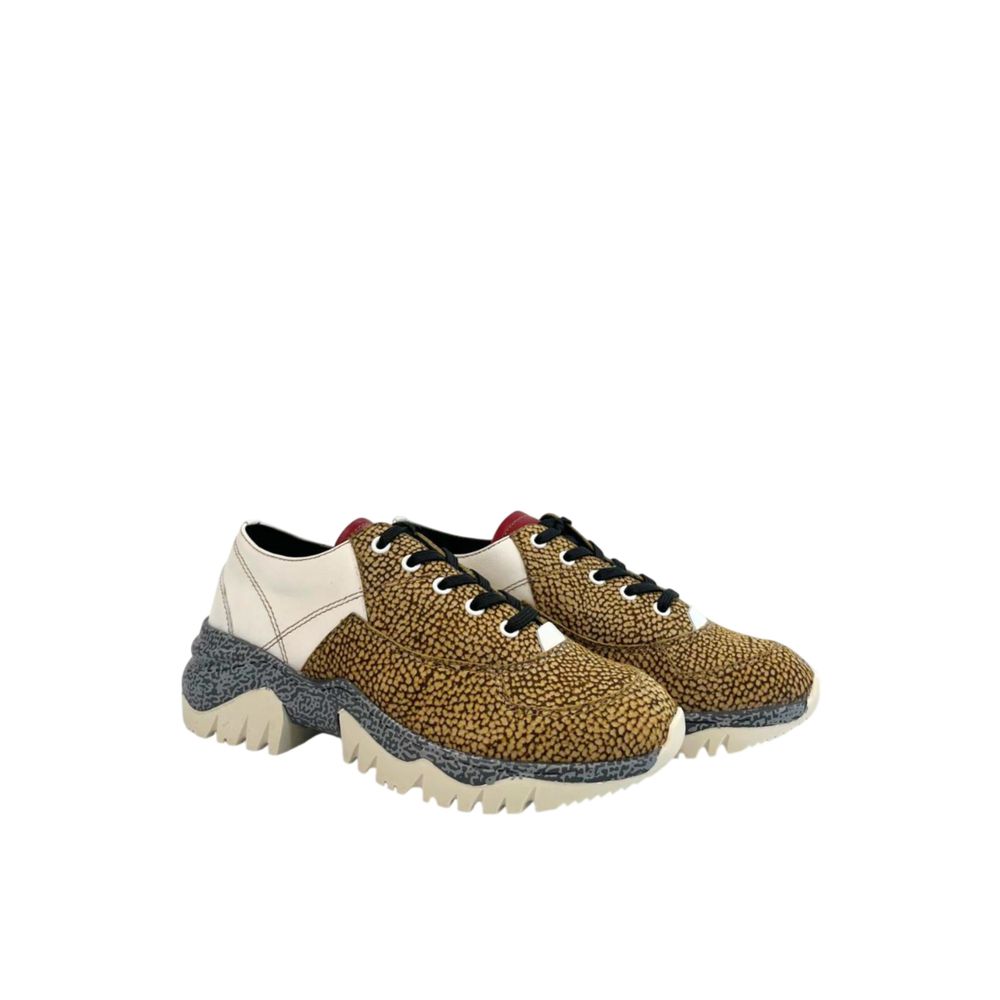 A pair of women's sneakers with a beige leather upper, white laces, and a chunky sole