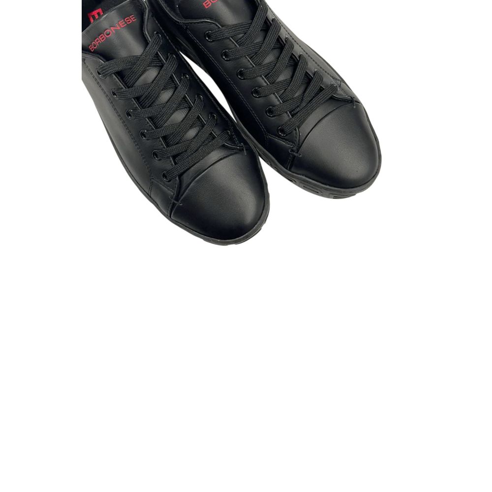 A pair of black leather men's sneakers with white laces