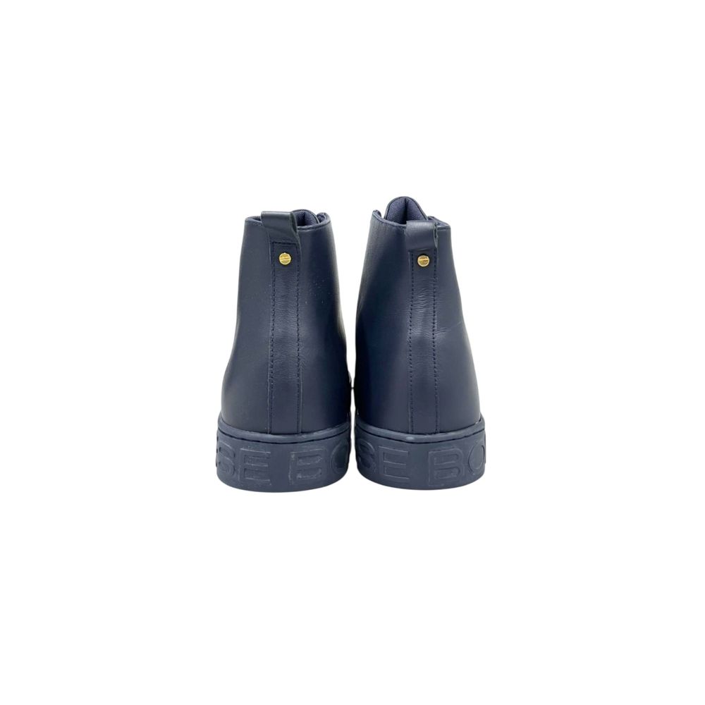 Pair of blue genuine leather men's sneakers with yellow laces and a white logo on the side