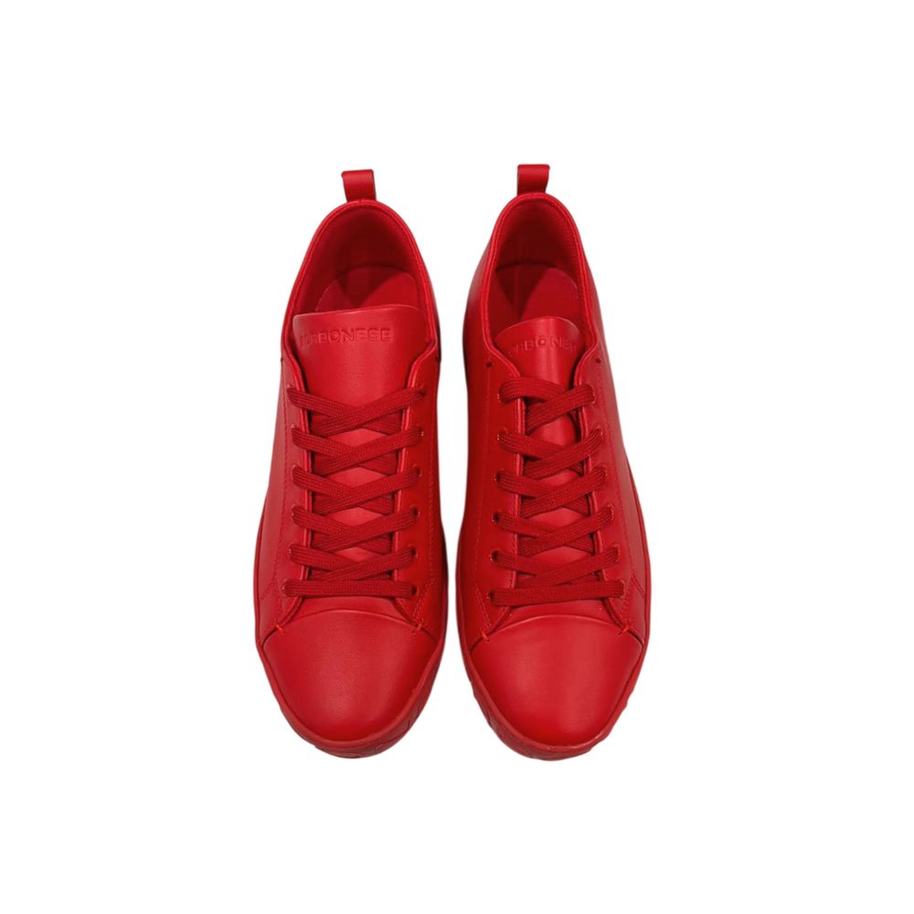 Pair of red leather men's sneakers with white laces