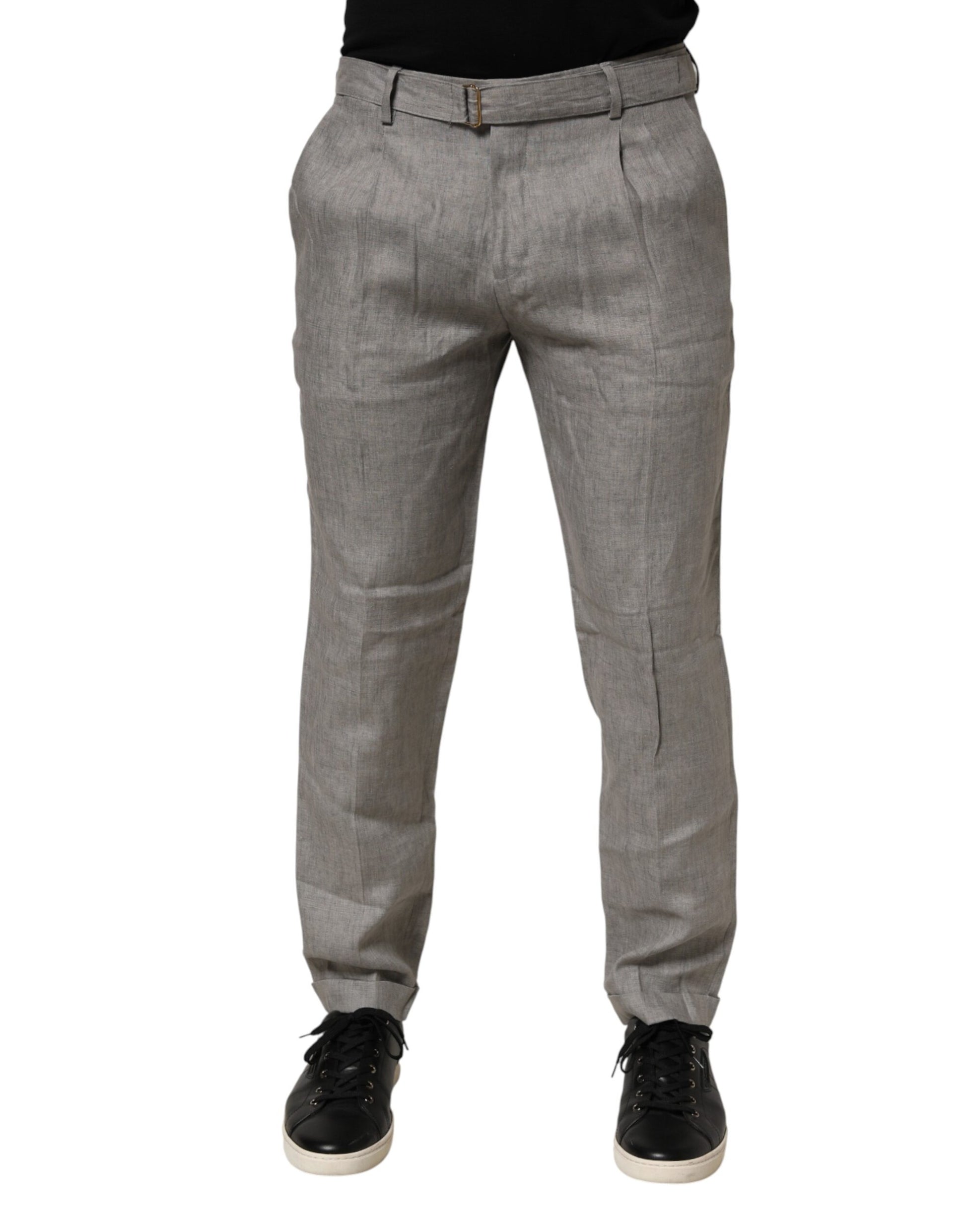 A pair of gray mid-waist dress pants for men, featuring a skinny fit and a formal design
