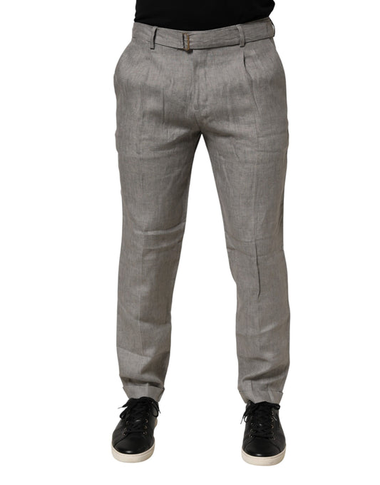 A pair of gray mid-waist dress pants for men, featuring a skinny fit and a formal design