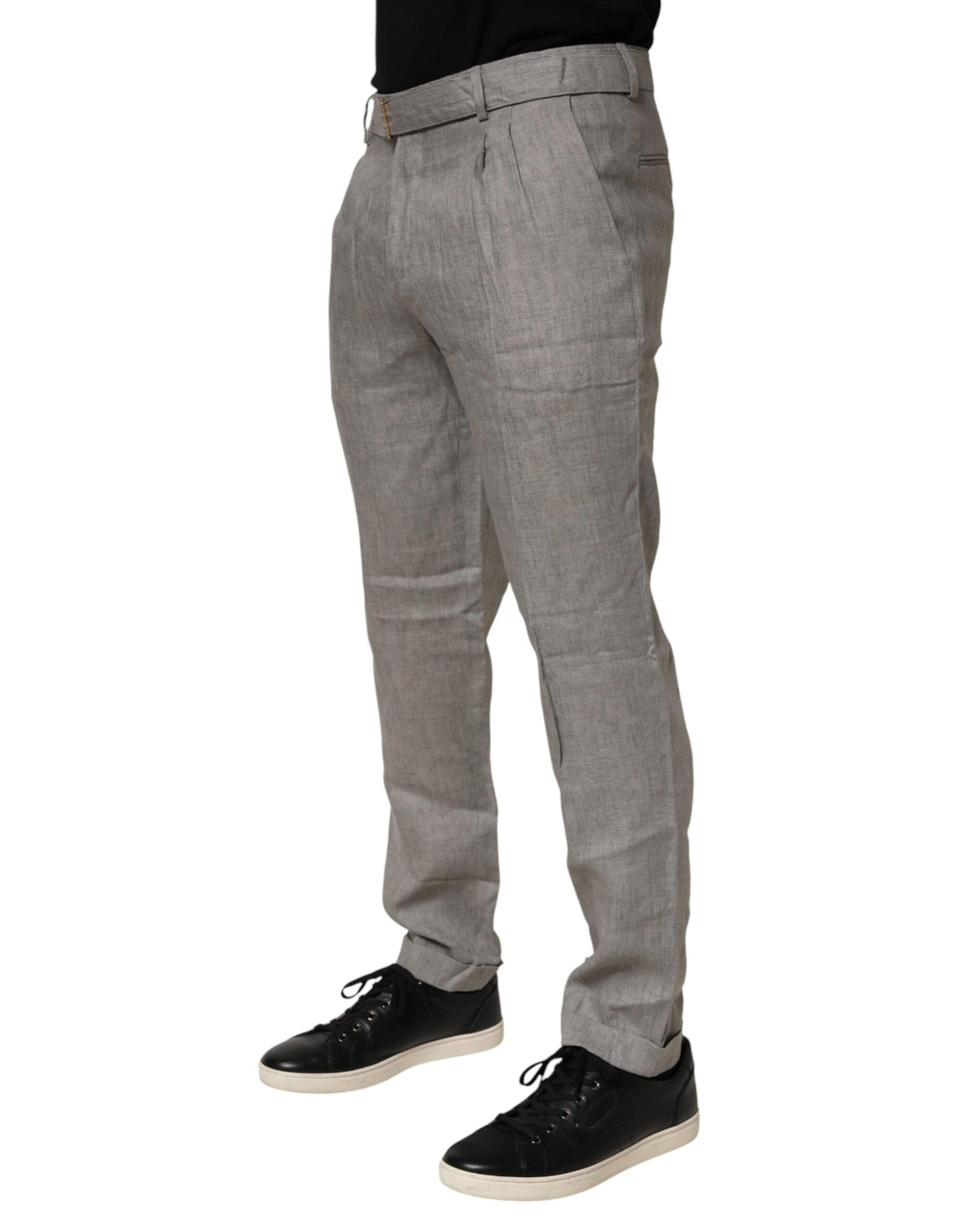A pair of gray mid-waist dress pants with a skinny fit