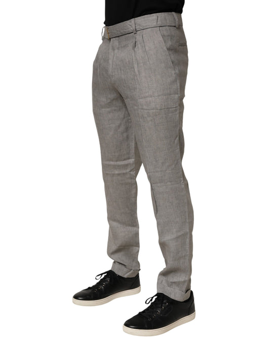 A pair of gray mid-waist dress pants with a skinny fit