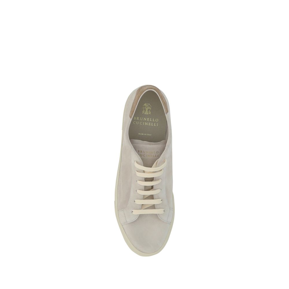 Tan canvas sneaker with white laces