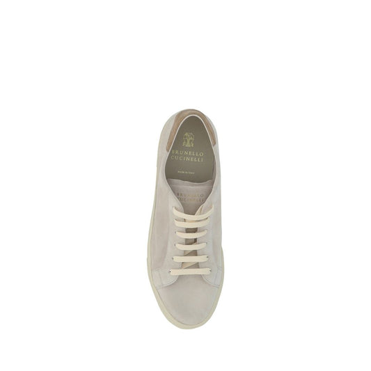 Tan canvas sneaker with white laces