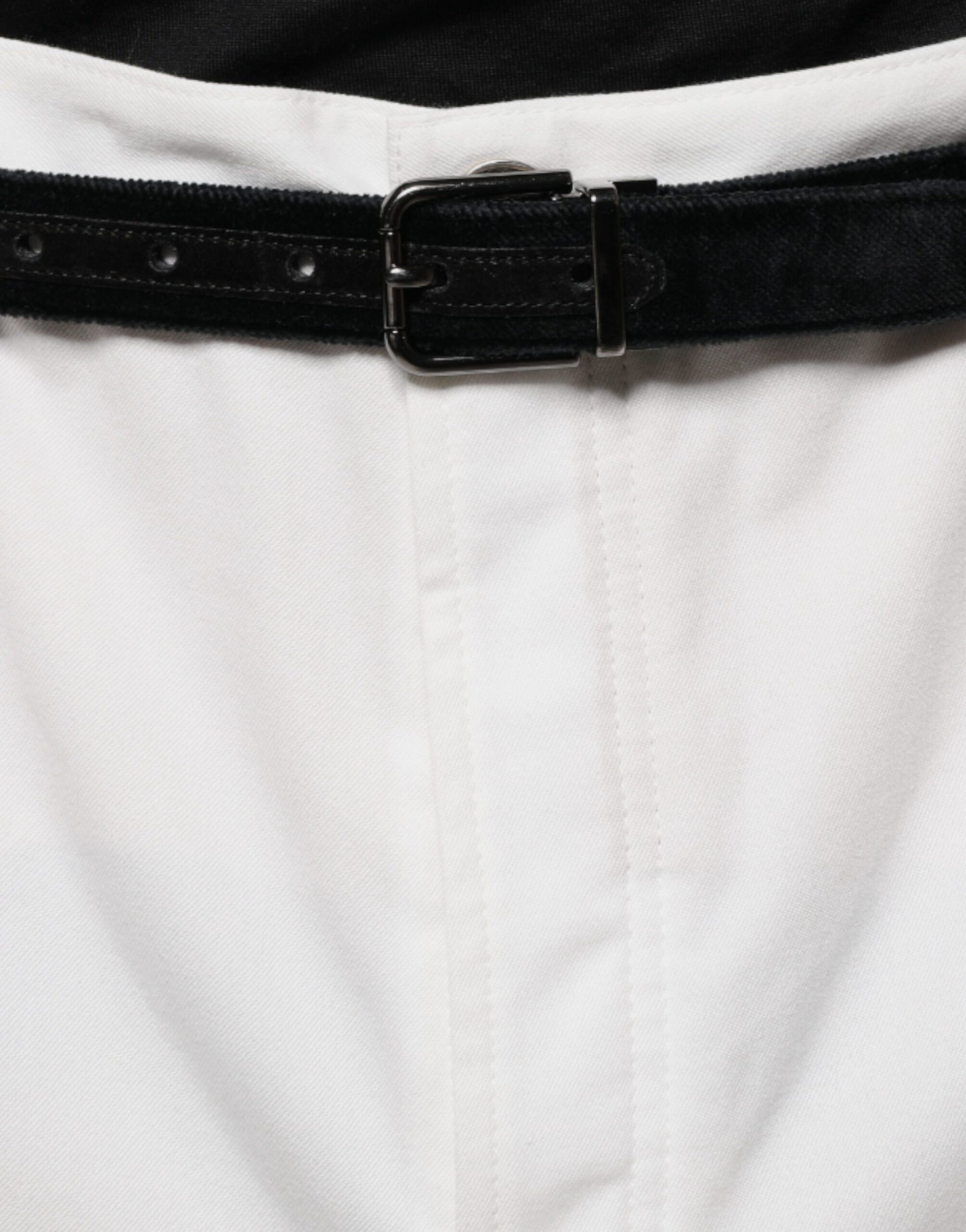 A pair of white cotton men's dress pants with a belt loop and a black belt