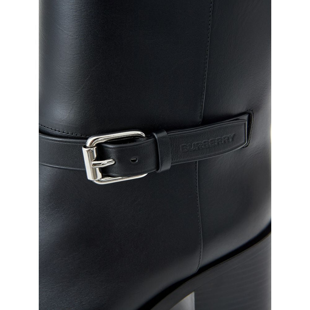 Black leather boot with silver buckle