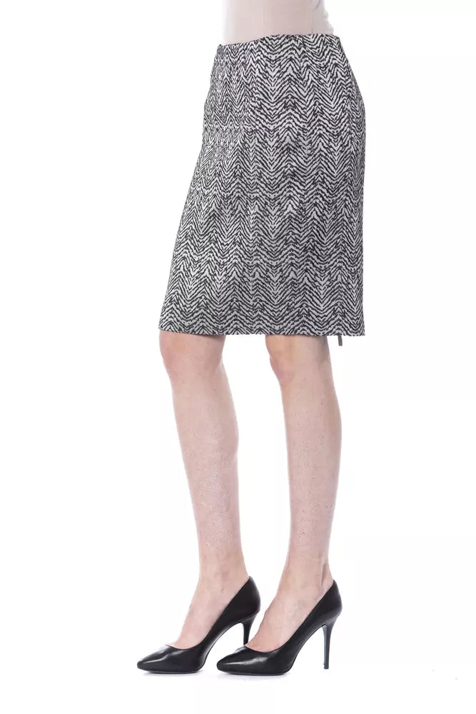 Black and white patterned skirt worn by a woman