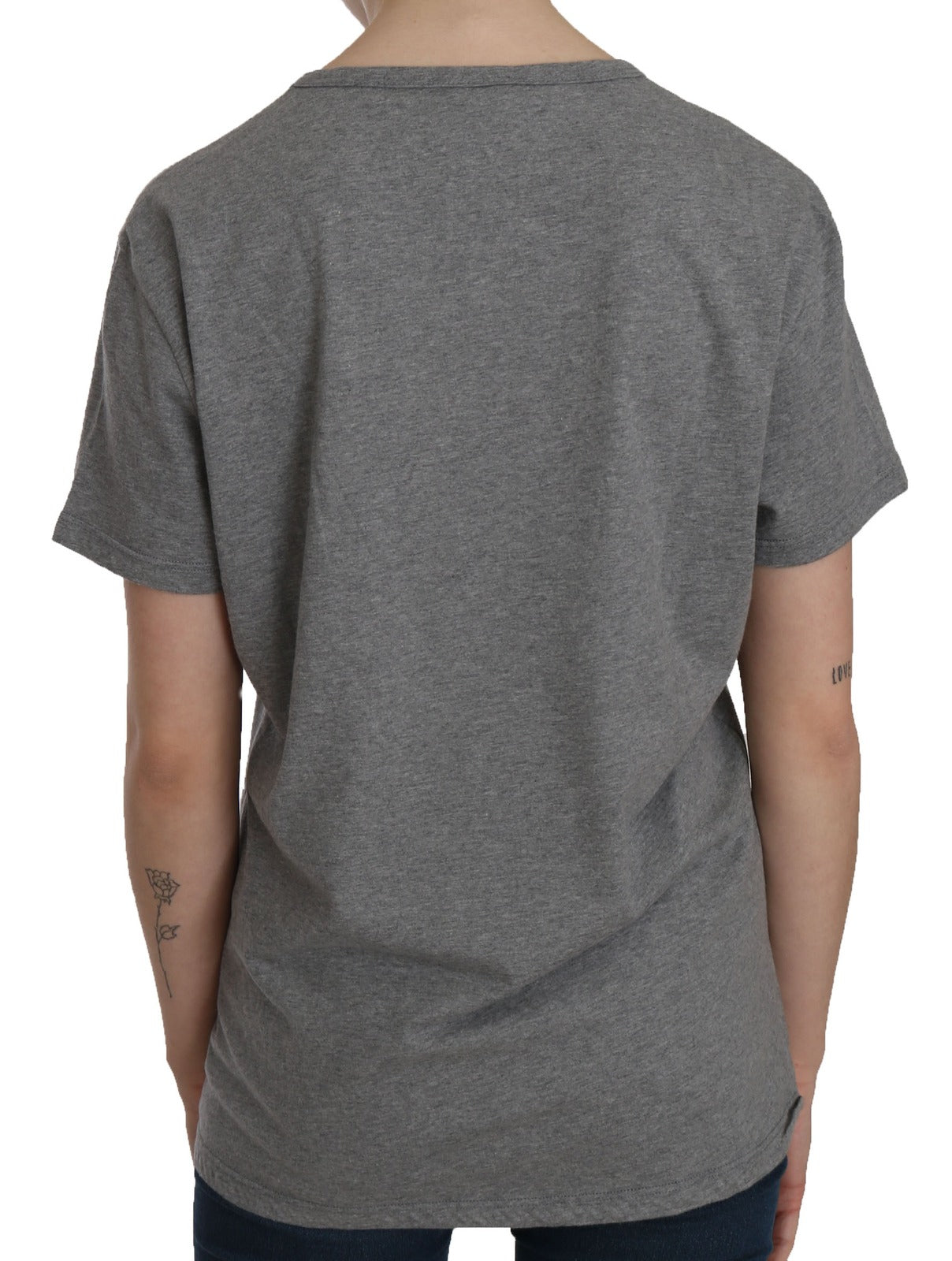 Grey short sleeve t-shirt on a person's back