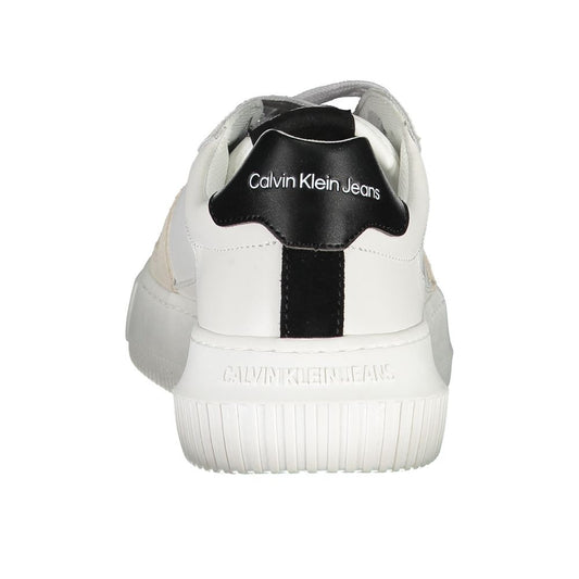 White sneaker with black stripe on side, featuring brand logo in black text