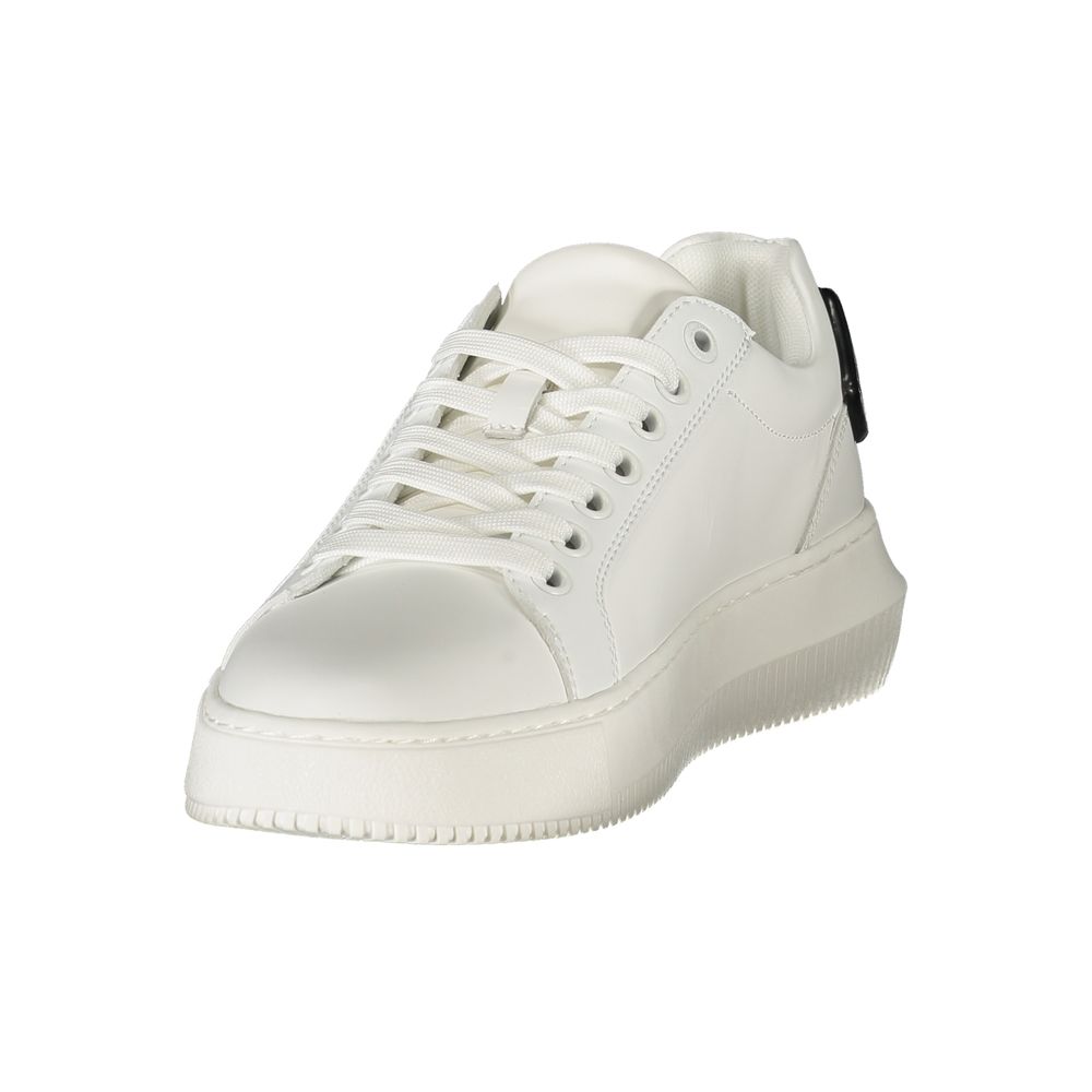 White sneaker with black laces and sole, featuring a low top design