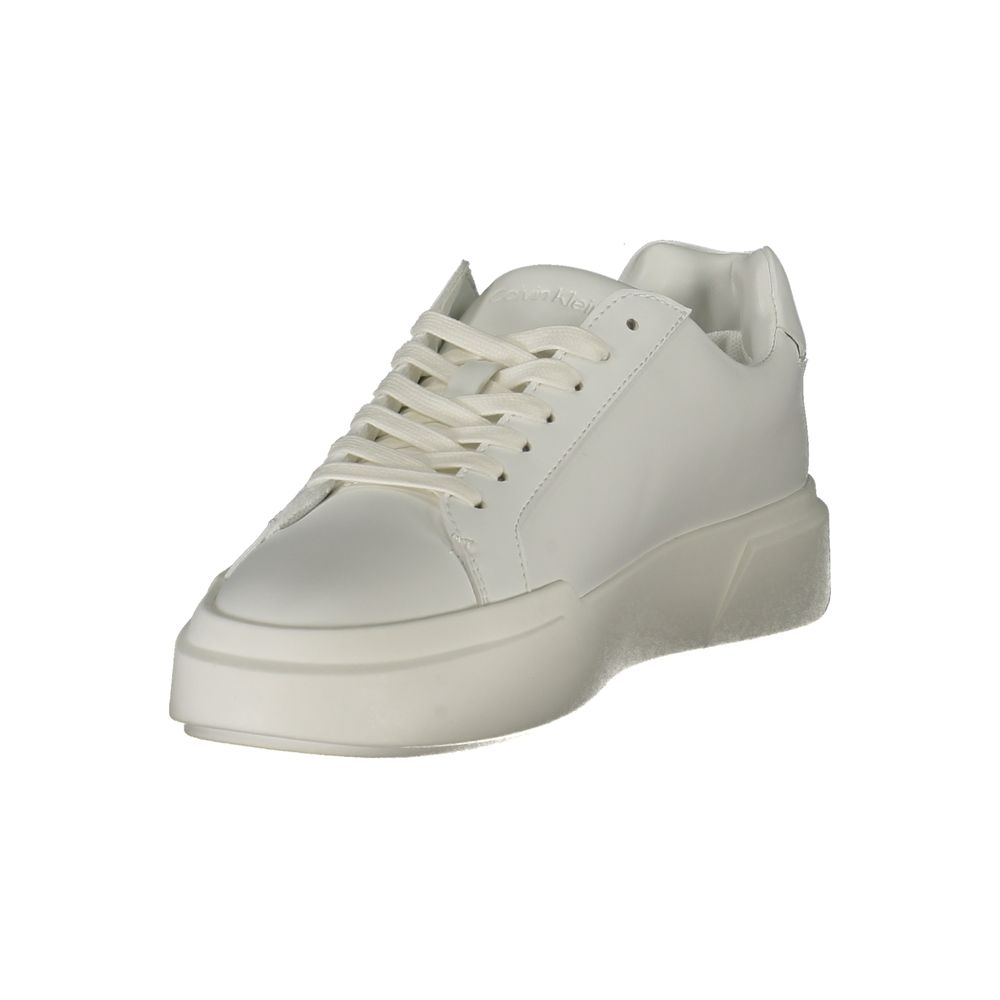 White sneaker with laces, featuring a low top design and a chunky sole