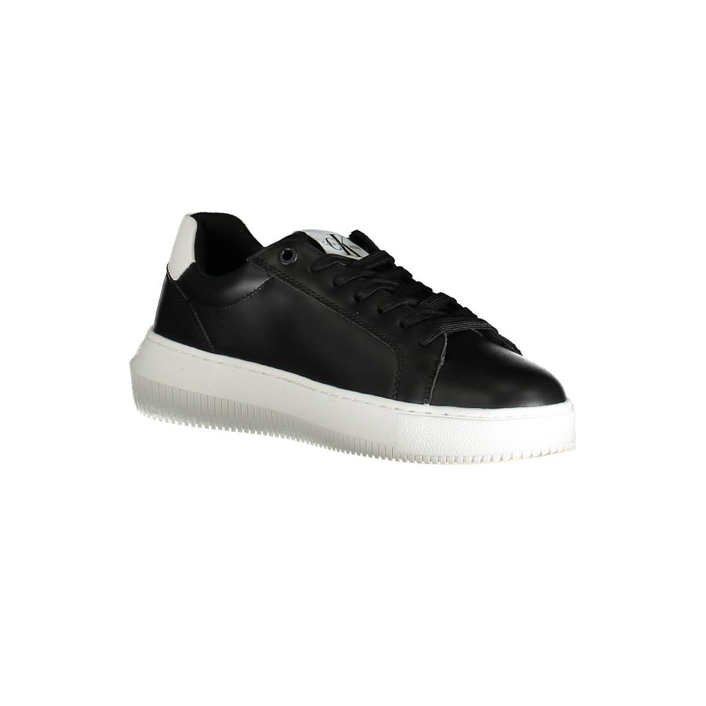 A black leather women's sneaker with white sole, featuring a lace-up front and a flat sole design