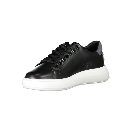 A black leather women's sneaker with white sole, featuring a lace-up front and a round toe design
