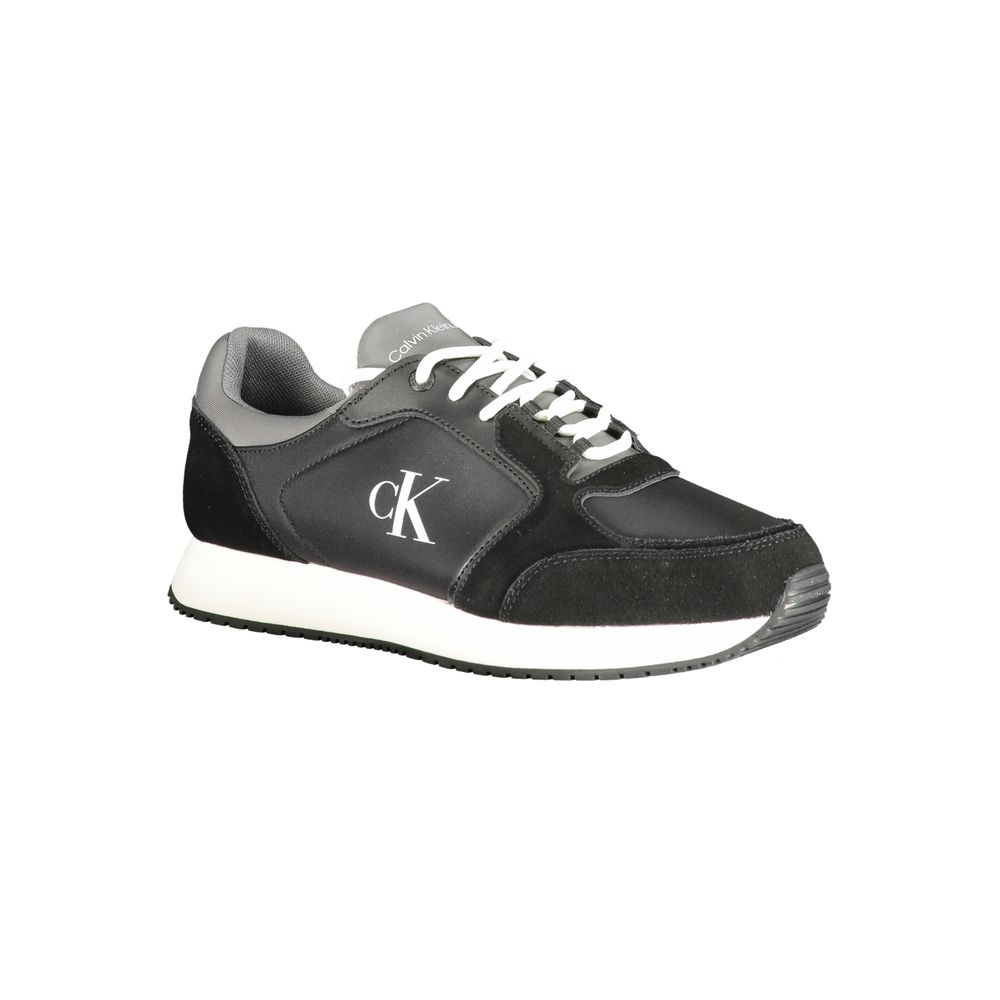 A black polyurethane men's sneaker with white sole, featuring a logo on the side