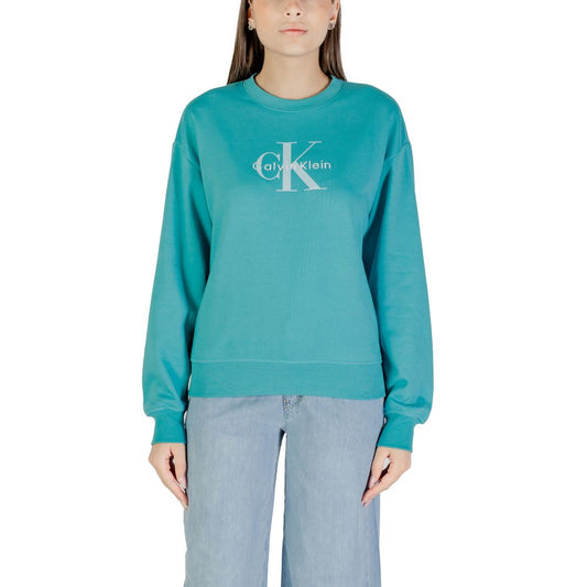Woman wearing blue sweatshirt with white logo