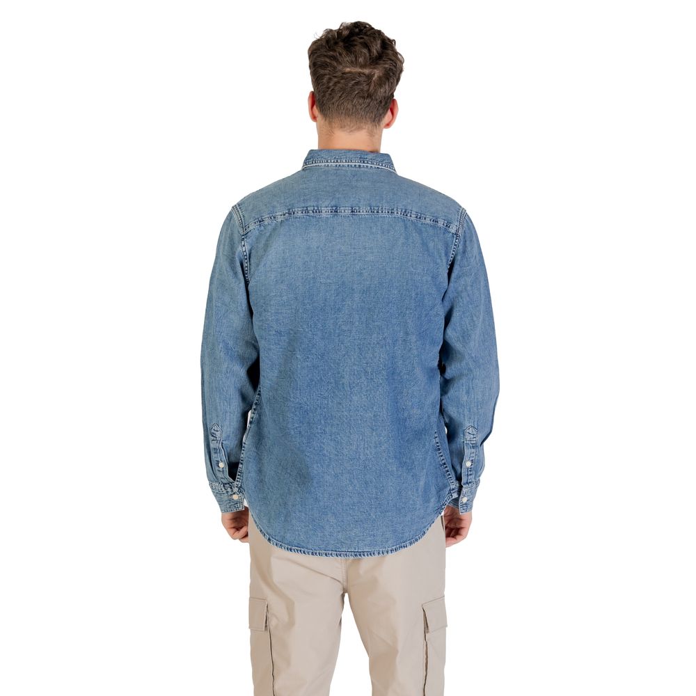 Man wearing blue denim jacket