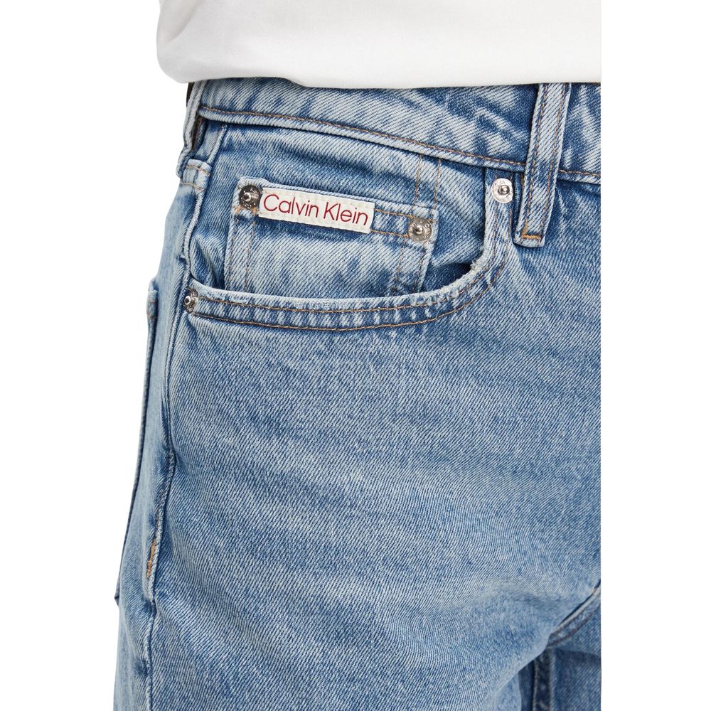 Blue denim jeans with a brand label on the back pocket