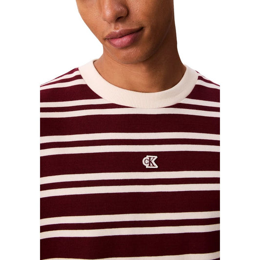 Red and white striped t-shirt with a small logo on the left chest area