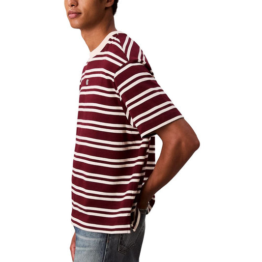 A mannequin wearing a red, white, and black striped t-shirt