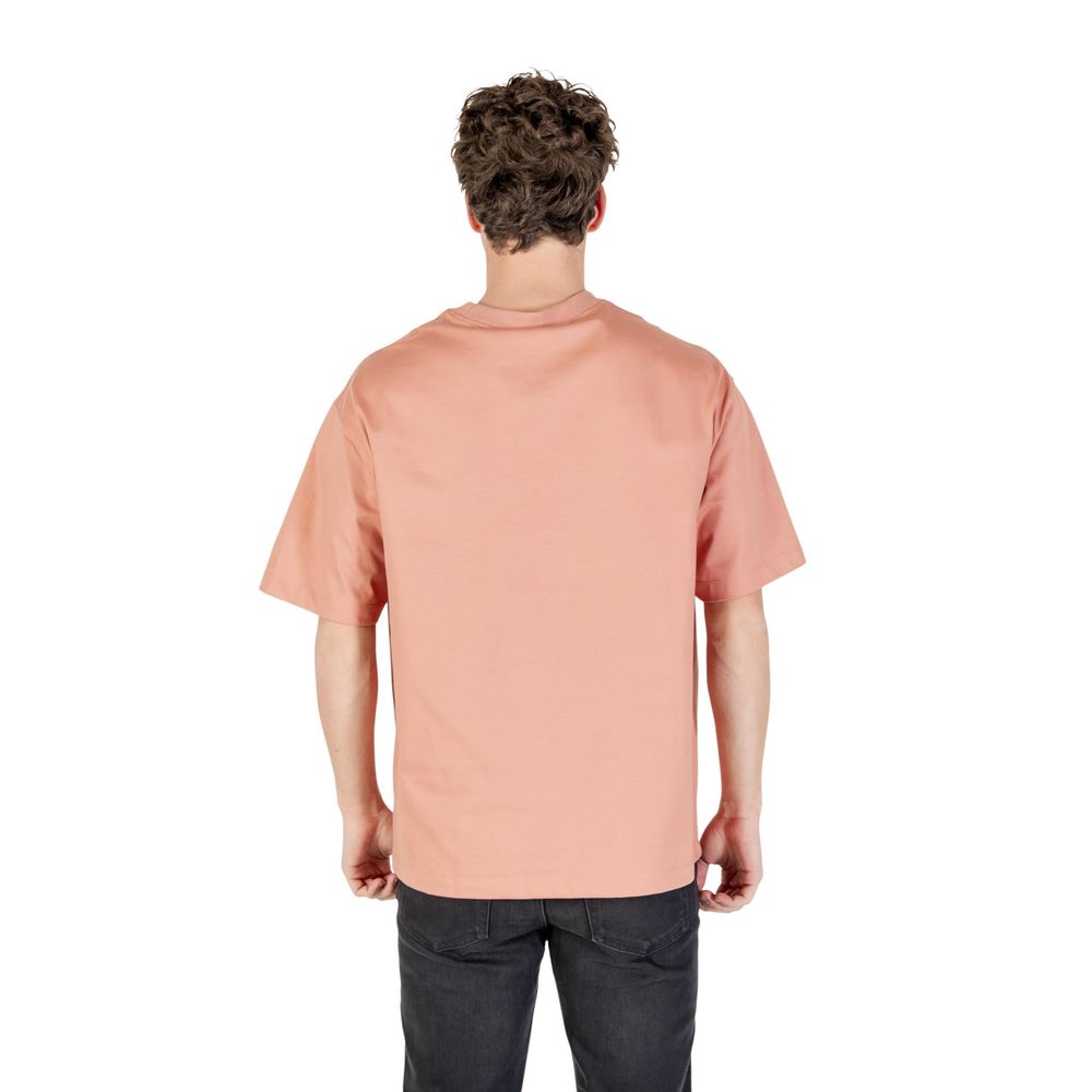 Man wearing pink shirt